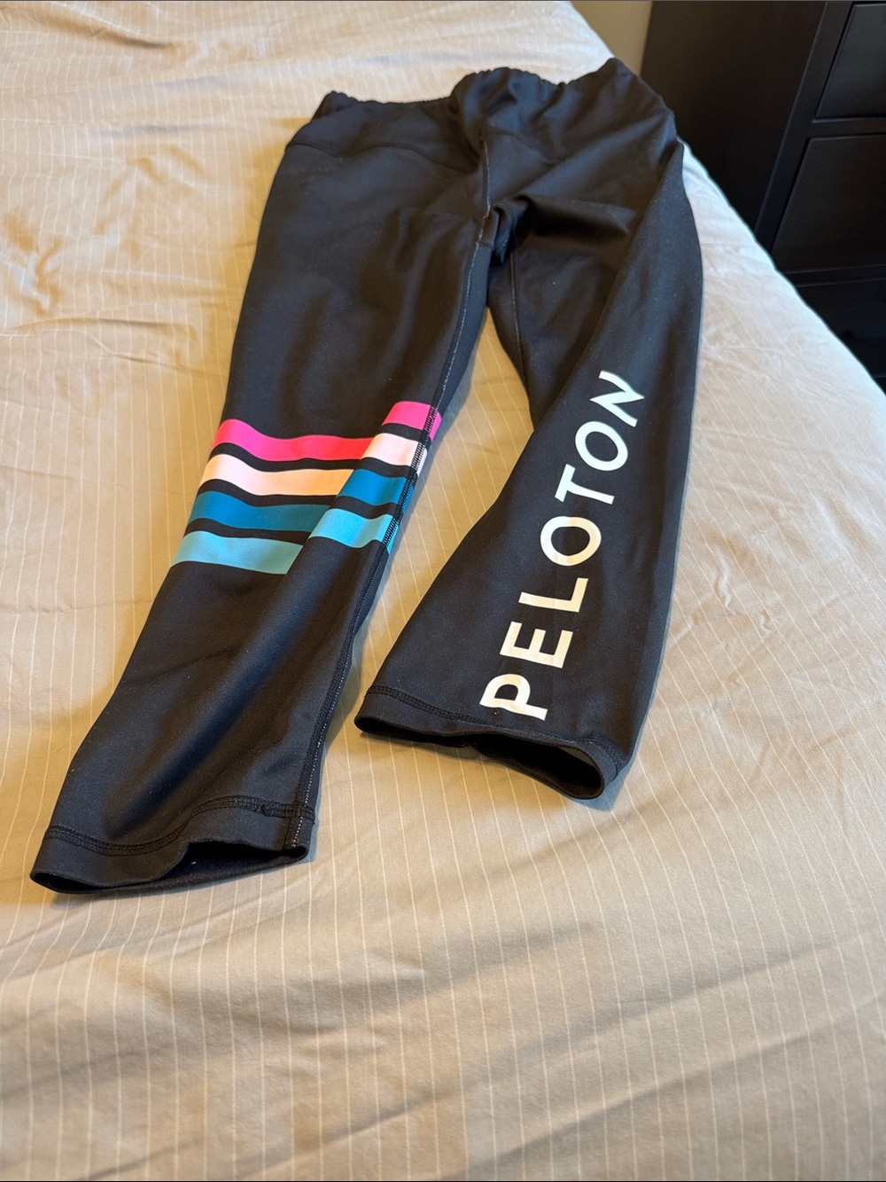 Peloton Black Leggings with Pink and Teal Stripe Accents
